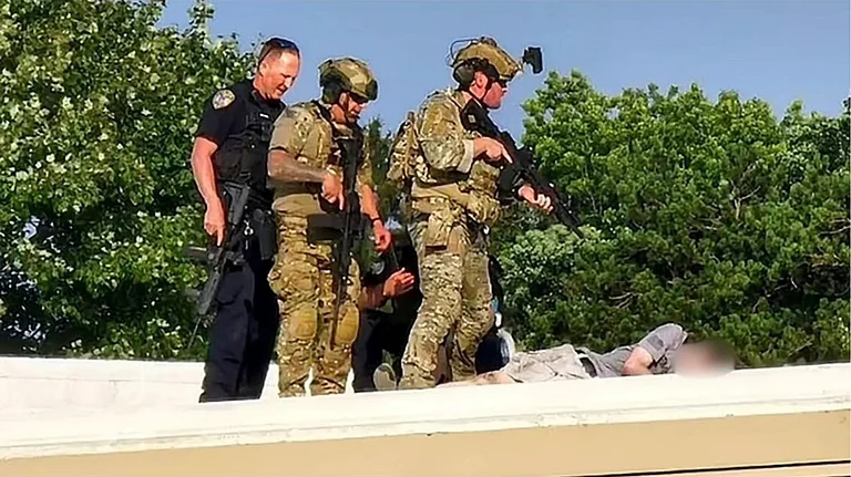 Thomas Mathew Crooks was "neutralized" by Secret Service agents. - X